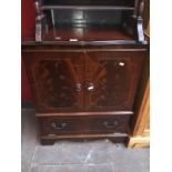 A reproduction av cabinet