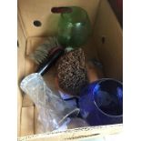3 glass vases, a hand brush and a hedgehog