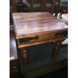 A rustic style hardwood side table