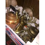 A box of brass and copperware to include lamp, teapot, deer, mirror, etc.