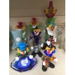 Various coloured glass clowns