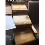 A set of chrome framed and laminate adjustable kitchen bar stools