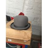 A vintage Dunn & Co grey bowler hat, size 7 - 57, in original box.