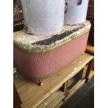 A pink woven bedding box