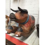 A rocking wooden pig