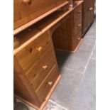 A pine dressing table and mirror