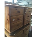 A pair of pine bedside chests