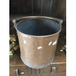 A copper coal bucket