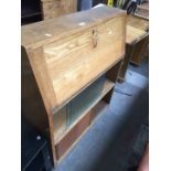 An oak and glass sliding bureau bookcase