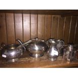 A collection of silver plate including a tea caddy, teapot, cutlery etc.