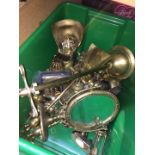 A box of brassware to include bells, fire tidy, mirror, etc.