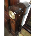 An oak cased granddaughter clock together with another granddaughter clock-case only