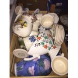 A box of assorted pottery, cups, saucers and vases