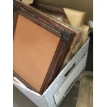 A box of unused assorted picture frames.