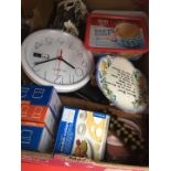 A box of misc to include wall clock, cookie cutters, light bulbs, golf balls, ornaments, etc.