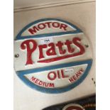 A painted advertising cast iron plaque "Motor Pratts Oil Medium Heavy"