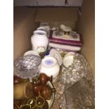 A box of assorted china cups and glassware