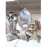 Metal candlesticks and mirror