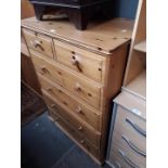 A pine chest of drawers