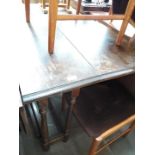 An oak drop leaf table