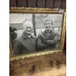 A photograph of Sir Tom Finney together with Tom Benson (The Marathon Man), signed on verso