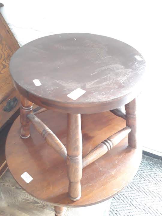 A stained beech round stool