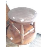 A stained beech round stool