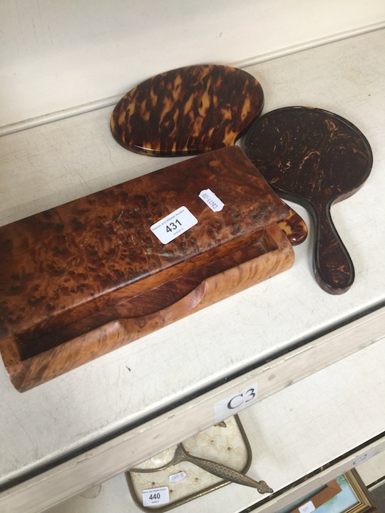 A burr wood pen tray and a pair of imitation tortoiseshell mirrors