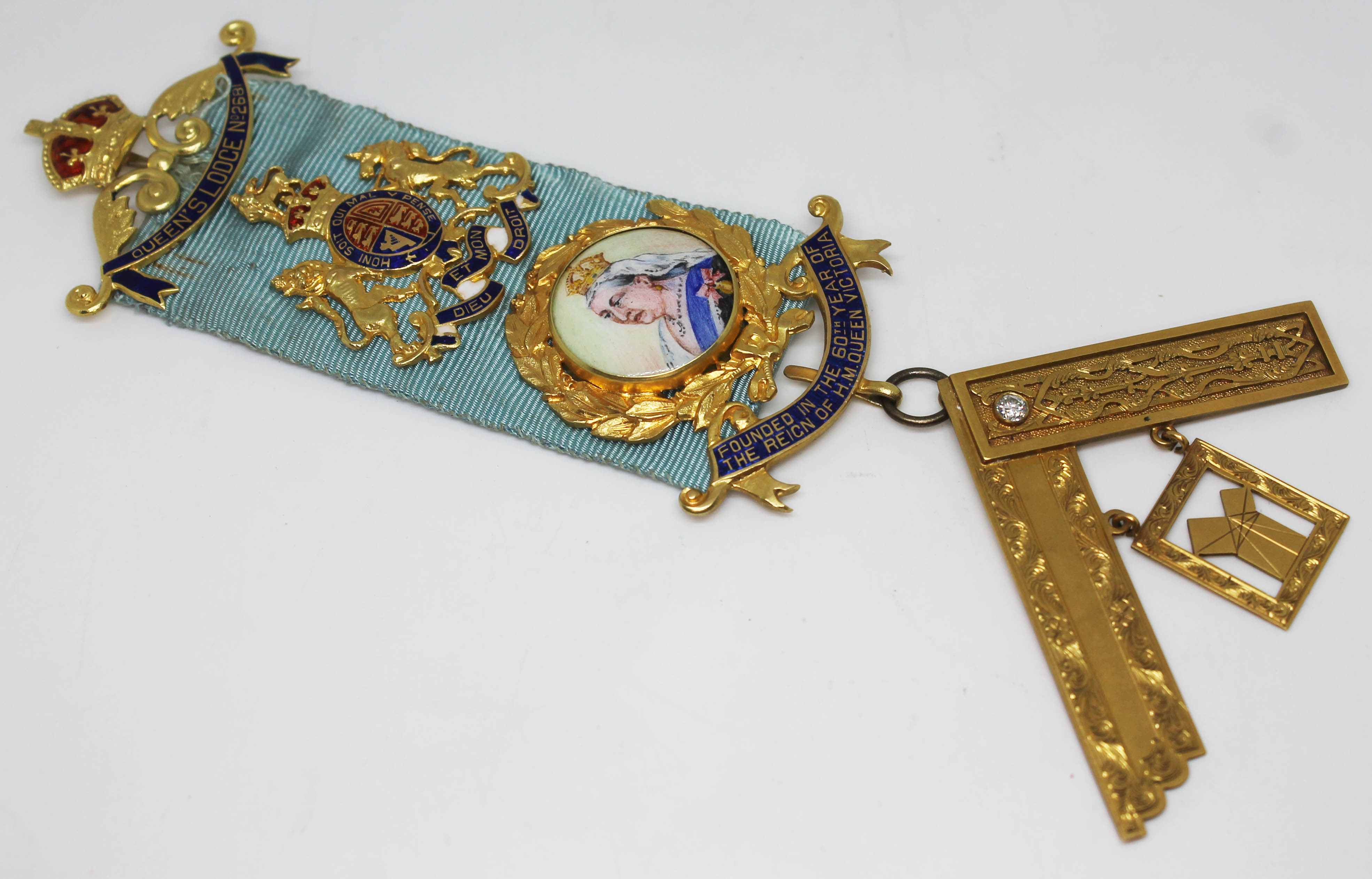 An 18ct gold Masonic jewel set with a diamond and a portrait miniature depicting Queen Victoria,