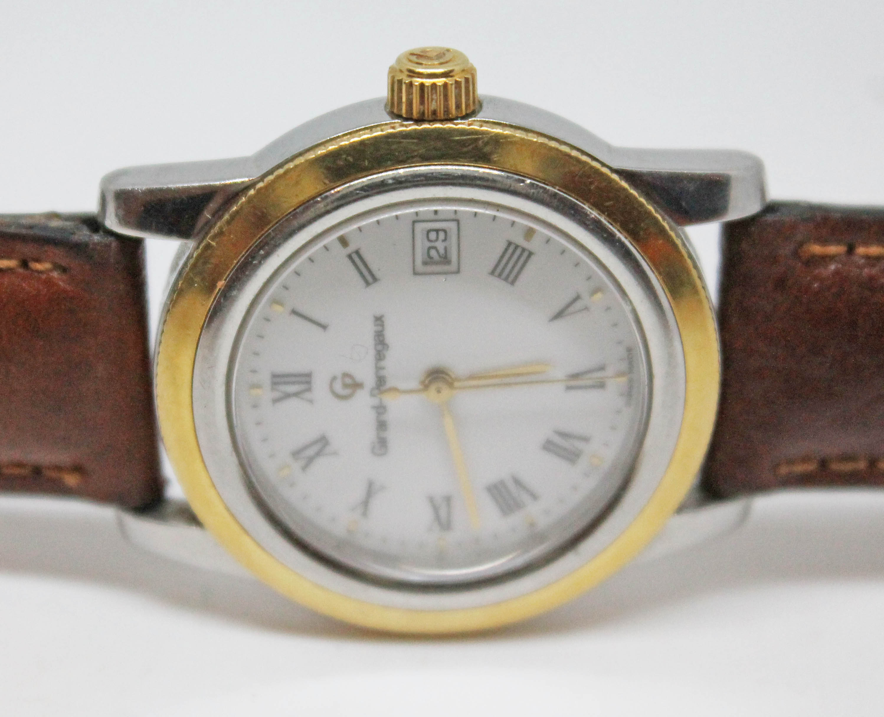 A Girard-Perregaux GP90 bi-metal wristwatch with signed white dial ...