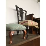 An Edwardian ebonised and pierced back nursing chair and a green top stool.