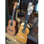 A group of six classical guitars.