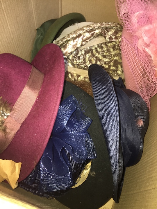 A box of ladies hats