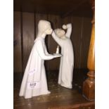 LLadro boy awakening and girl with candle