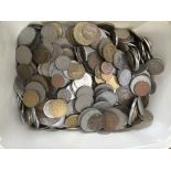 A tub of world coins and banknotes