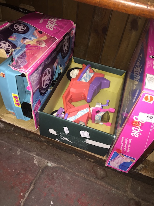 A Barbie jeep, scooter and a boxed Barbie bed