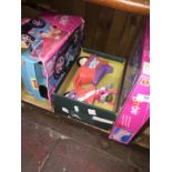 A Barbie jeep, scooter and a boxed Barbie bed