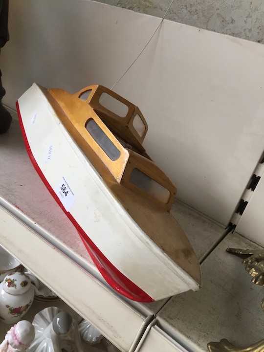 An RC wooden model boat - no remote.