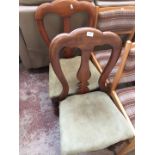 A pair of Victorian bolt back dining chairs.