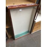 A glazed table top display cabinet.