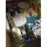 A box of kitchenware, games etc