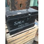 A black painted wooden box and two vintage crates.