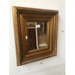 Gold framed gilt edged mirror