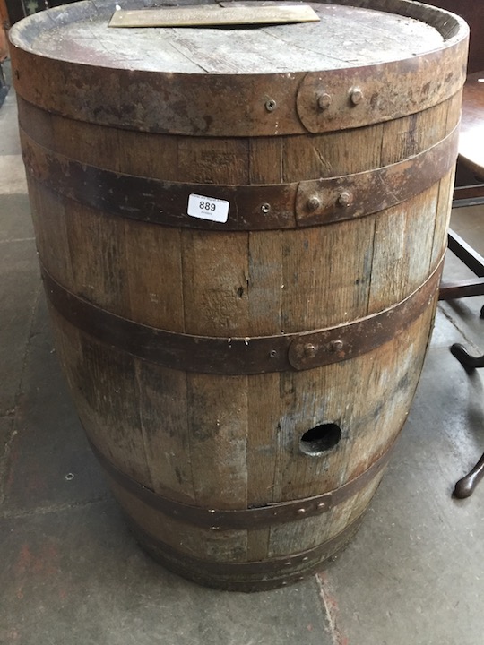 A metal bound oak barrel.