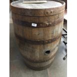 A metal bound oak barrel.