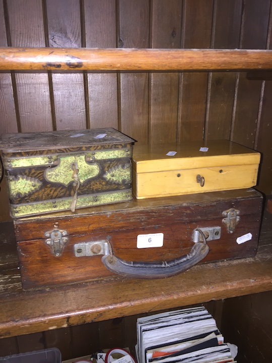 A wooden case with leather handle, tin box with key and a small wooden box with key