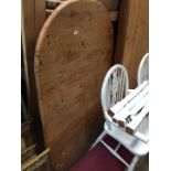 A white painted and pine table and chairs.