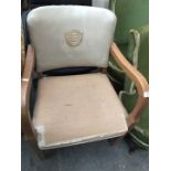 A 1950s light oak chair with cream leather back embossed 'THE FOOTBALL LEAGUE FOUNDED 1888',