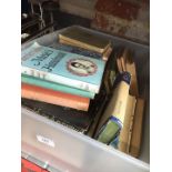 A box of books, mainly related to music.
