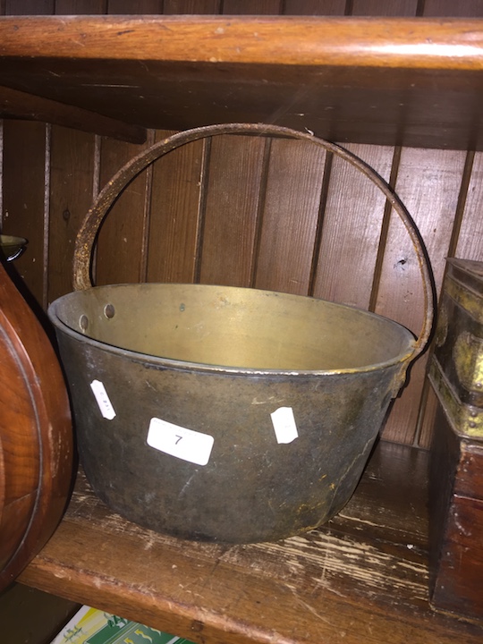 A brass jam pan.